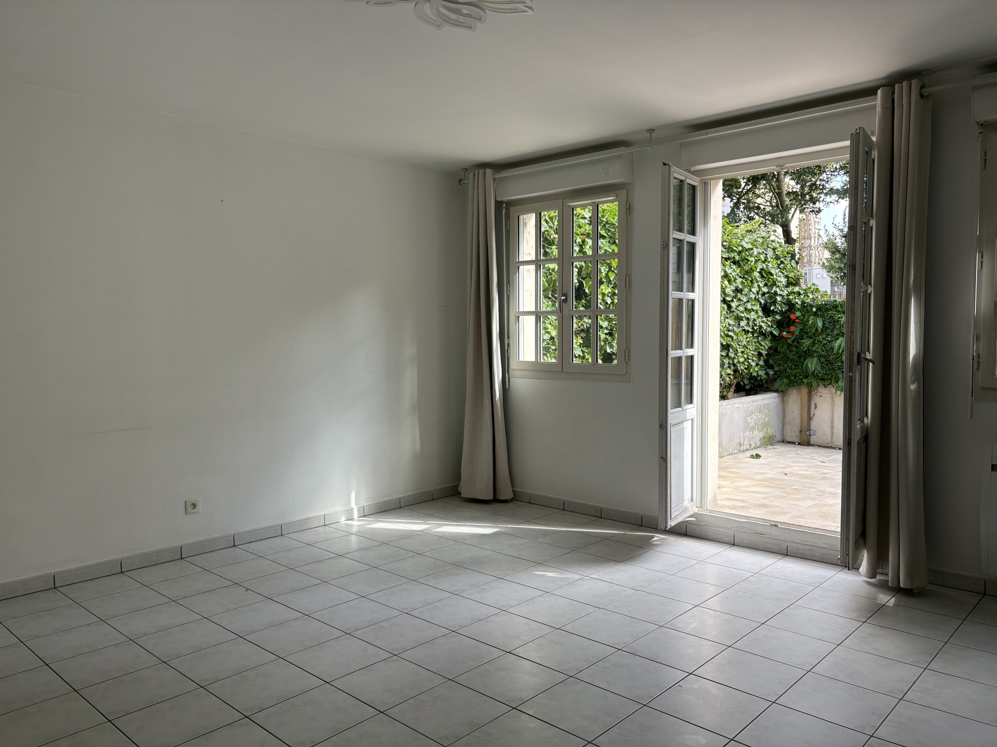 Immo80 – L'immobilier à Amiens et dans la Somme-Maison de 112,80 m2 située au coeur du centre ville avec belle terrasse